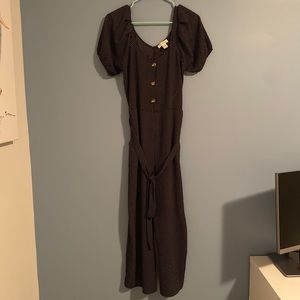 Like new black & white romper! PERFECT condition.